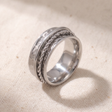Close view of a rope twist and a plain band turning on the Rope ring